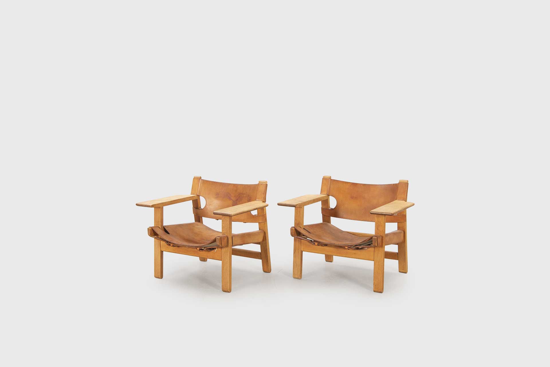 Pair of armchairs model “226” Manufactured by Frederica Stolefabrik Denmark, 1950s Solid oak, leather, brass﻿﻿